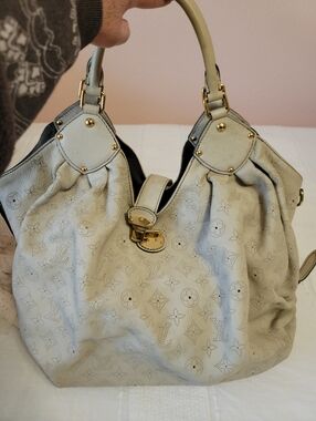 Louis Vuitton  Soft Grey/Cream Mahina Handbag.